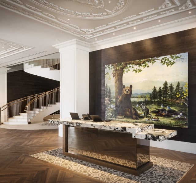 shot of the lobby and reception area showing spiral staircase