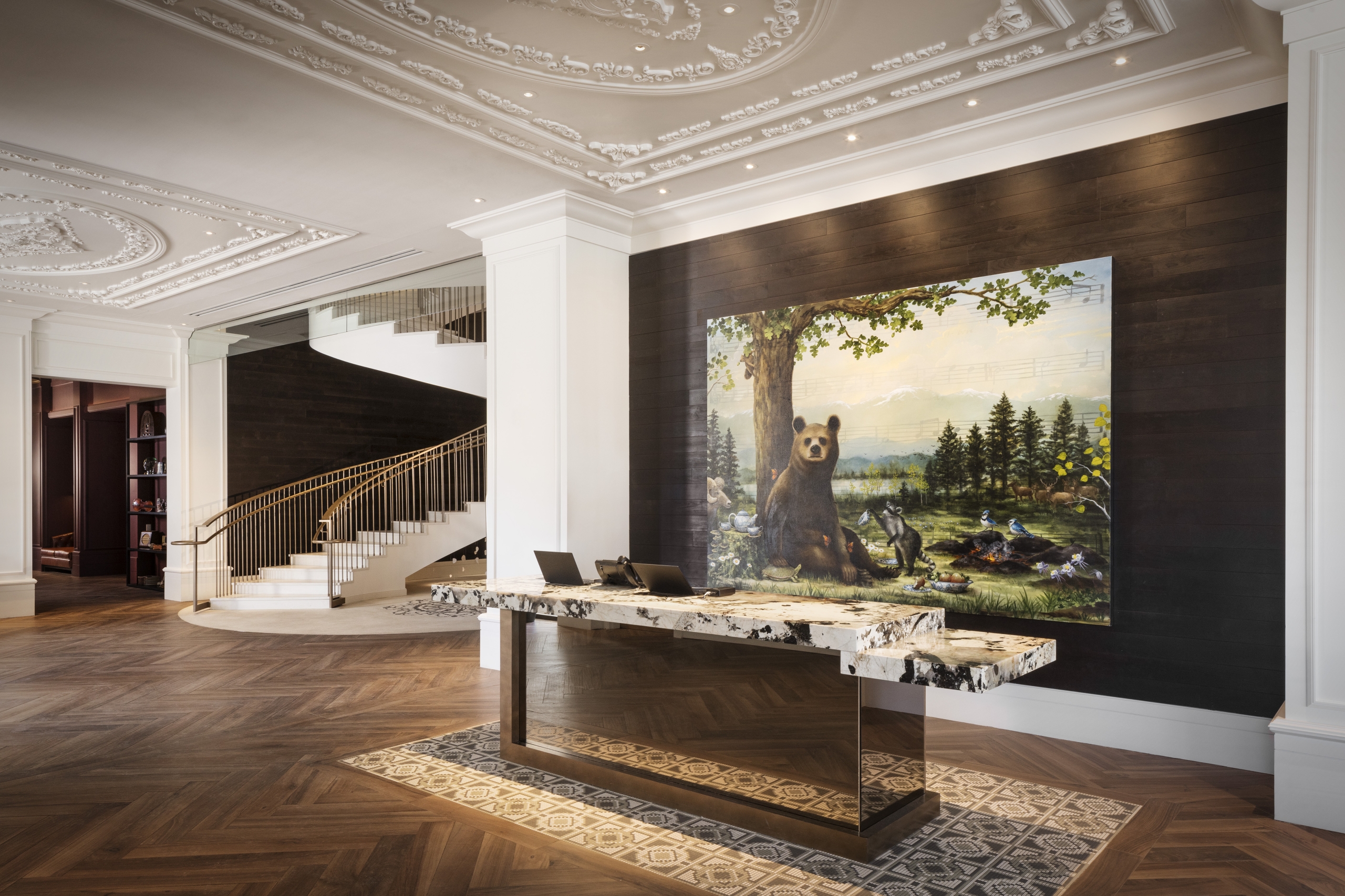 shot of the lobby and reception area showing spiral staircase