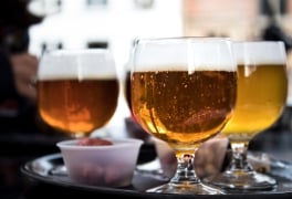 Three cups of belgium beer, amber and white