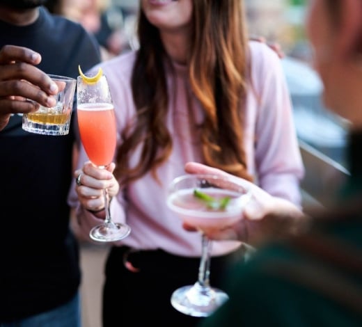 friends drinking cocktails