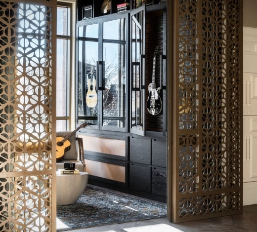 A room with several guitars on display at The Elizabeth hotel