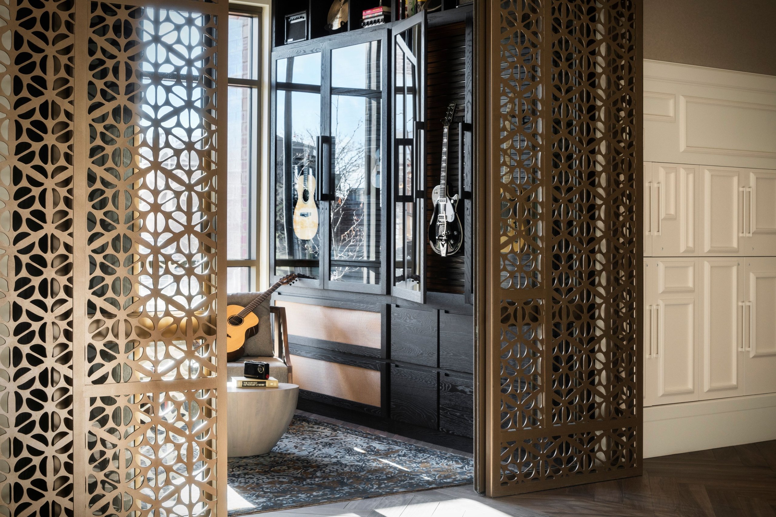 A room with several guitars on display at The Elizabeth hotel