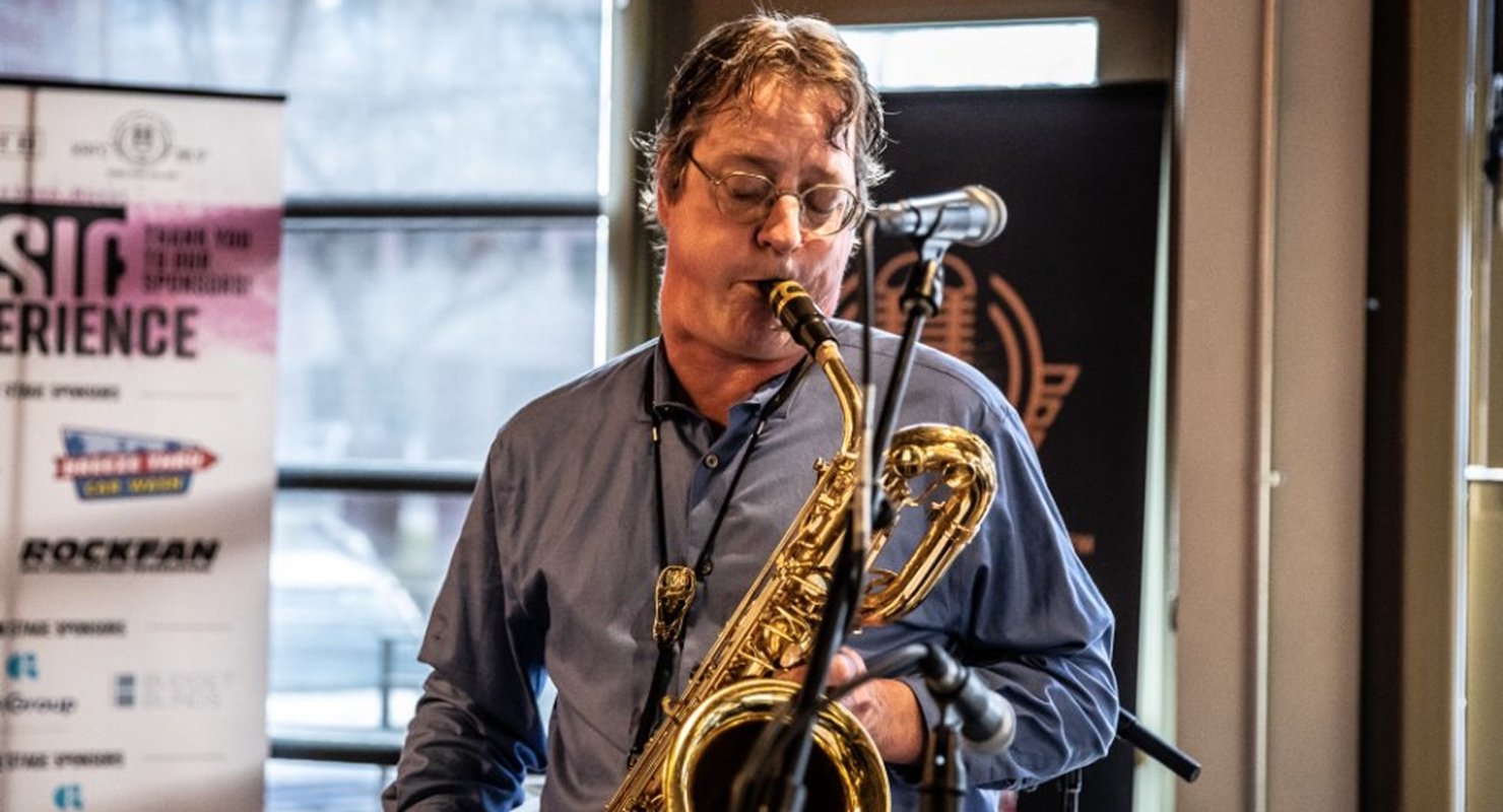 A saxophone player performs at Magic Rat