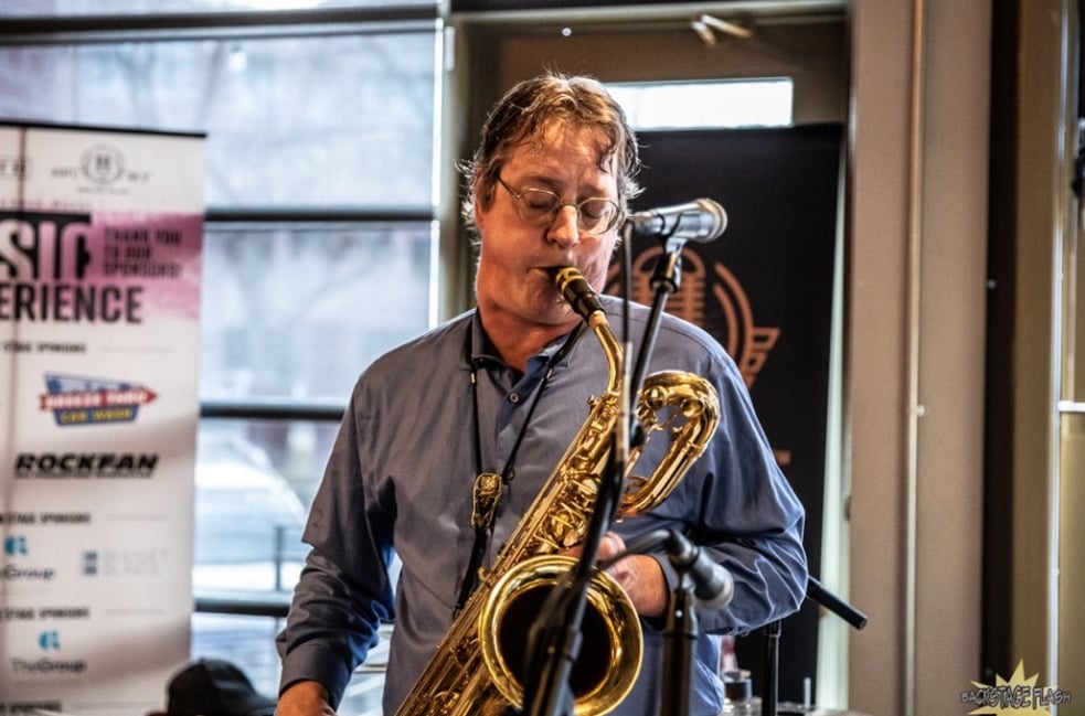 A saxophone player performs at Magic Rat