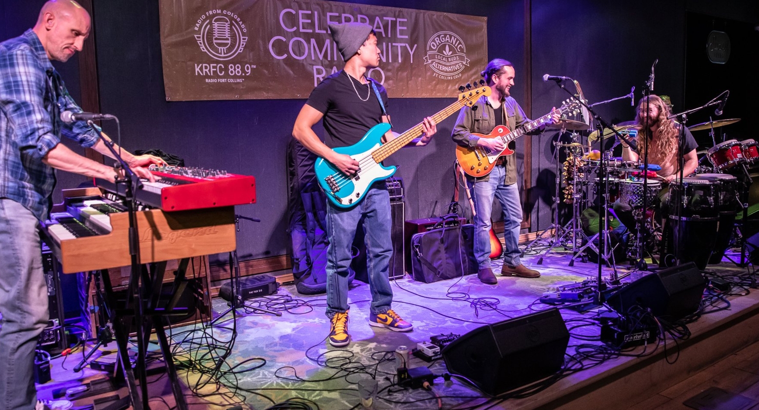 A rock band performs at Magic Rat