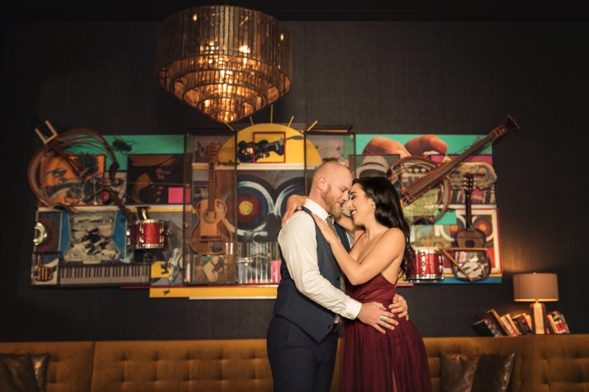 A couple slow dancing at a reception