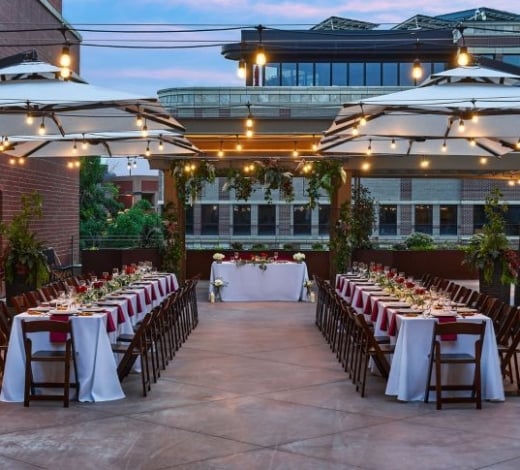 The Outdoor terrace, decorated for a night event with hanging string ligths