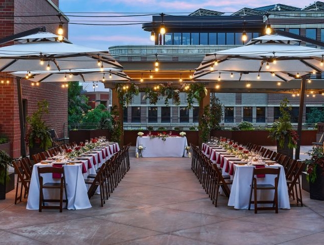 The Outdoor terrace, decorated for a night event with hanging string ligths