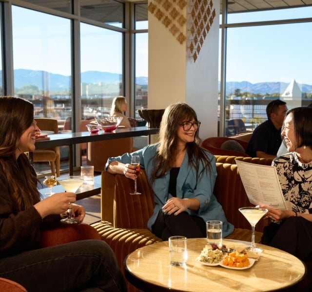 Group enjoying Wine and spirits at The Sunset Lounge