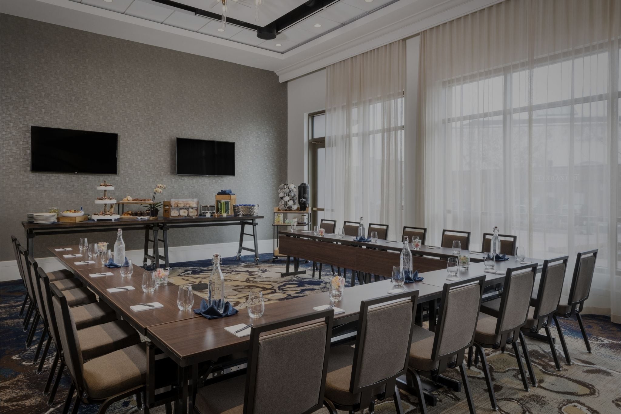 A meeting space at The Elizabeth Hotel set up for guests